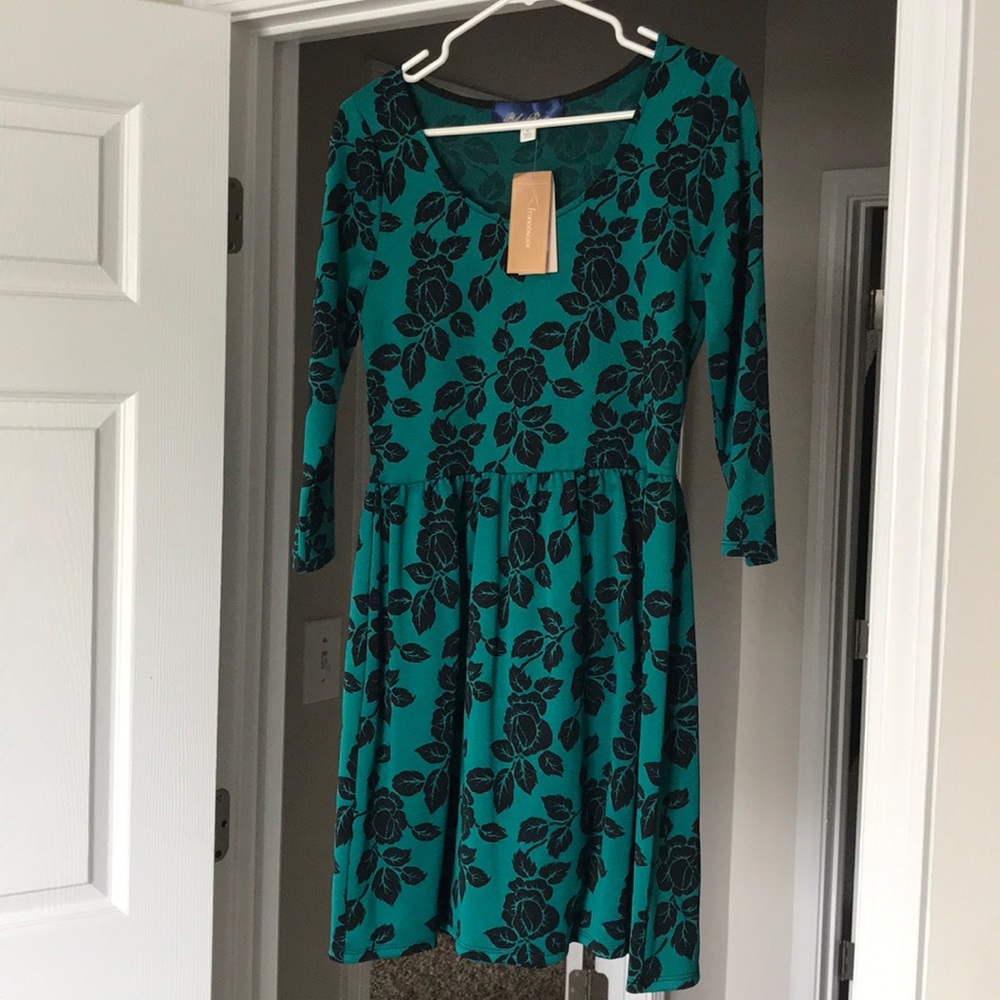 Green and black 3/4 sleeve dress from Francesca’s